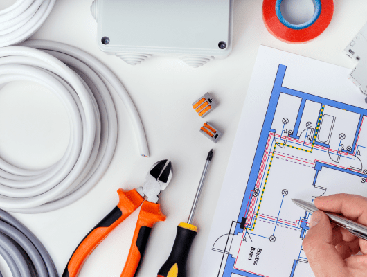 electrician checking electrical plans concept repair electrical equipment 1 min